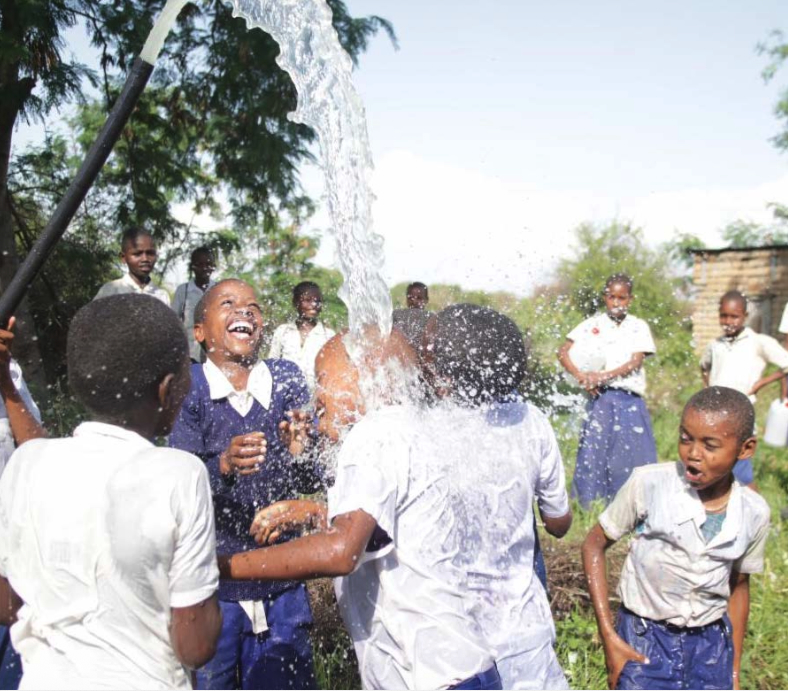 Children together in a full-width feature image representing the mission and impact of child-serving nonprofits
